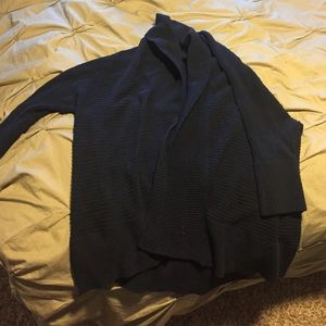 Navy blue cardigan, loose fit. 3/4 length sleeves.