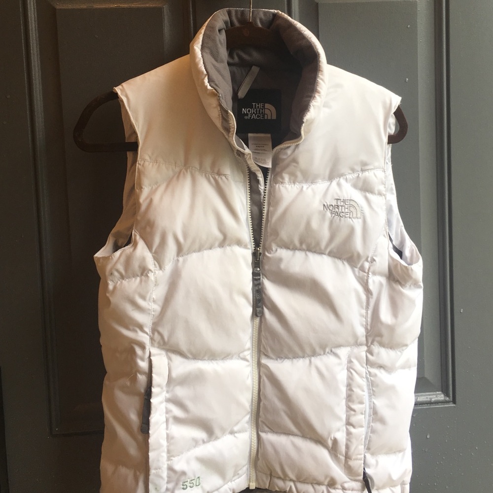White North Face vest, fairly worn