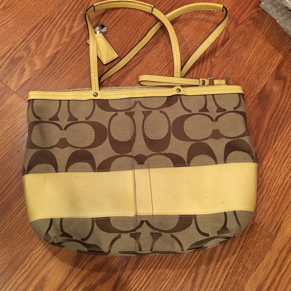 Yellow and tan coach bag