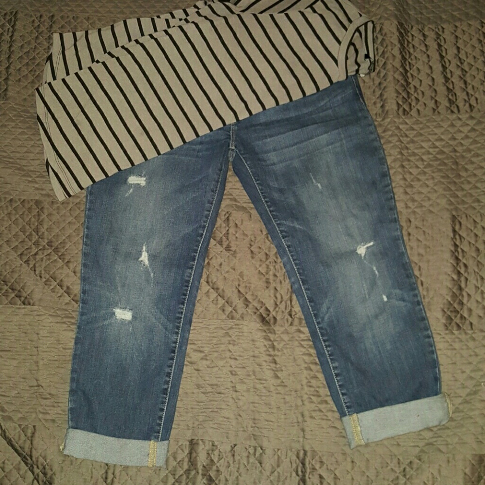 Dark blue distressed jeans