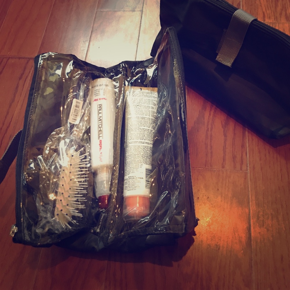 Paul Mitchell products, brush, and bag.