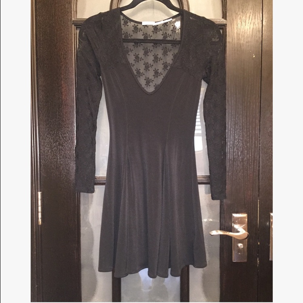 Black flowy mini dress with lace