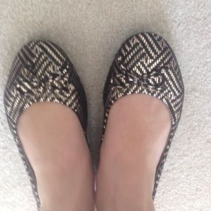Black and gold flats