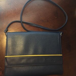 Leather bag by Disney Adventures 
Portfolio Blue