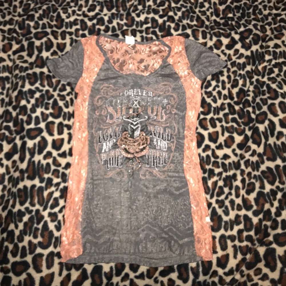 Sinful rhinestone and lace shirt.