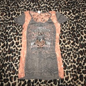 Sinful rhinestone and lace shirt.