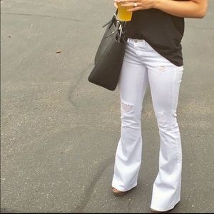 Flare distressed white denim