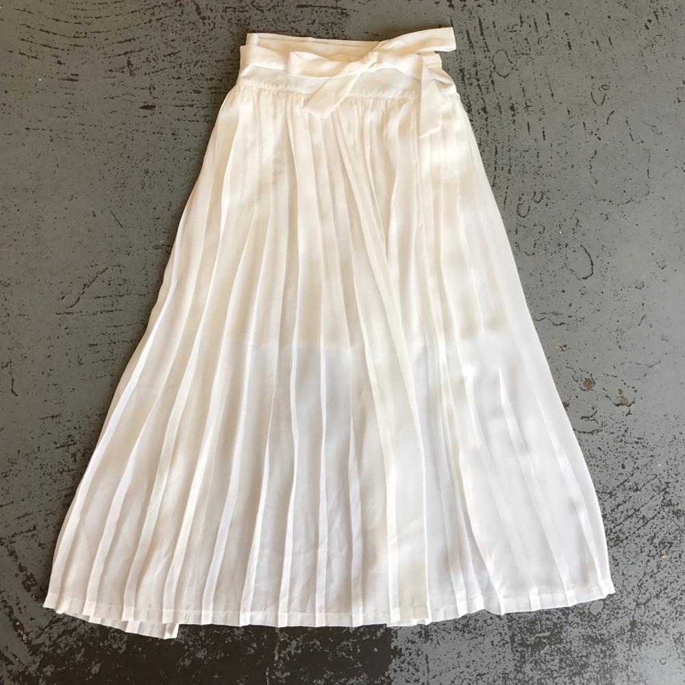 White pleated wrap midi skirt