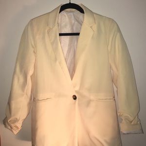 AA pale yellow blazer