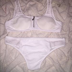 Mesh zip up bikini set.