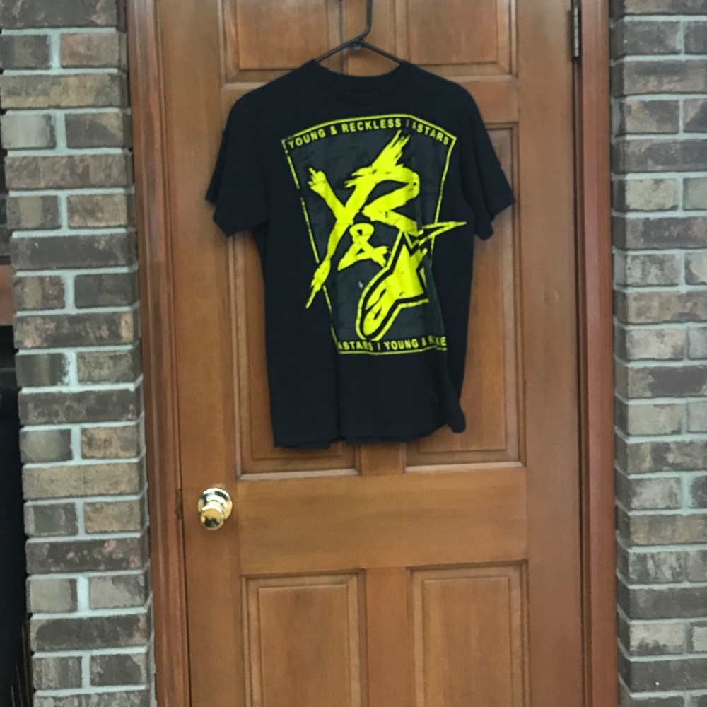 Young and reckless shirt size medium
