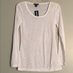 White long sleeved shirt with animal print.