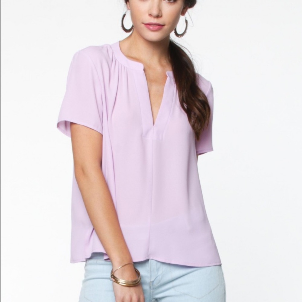 Lavender short sleeve top.