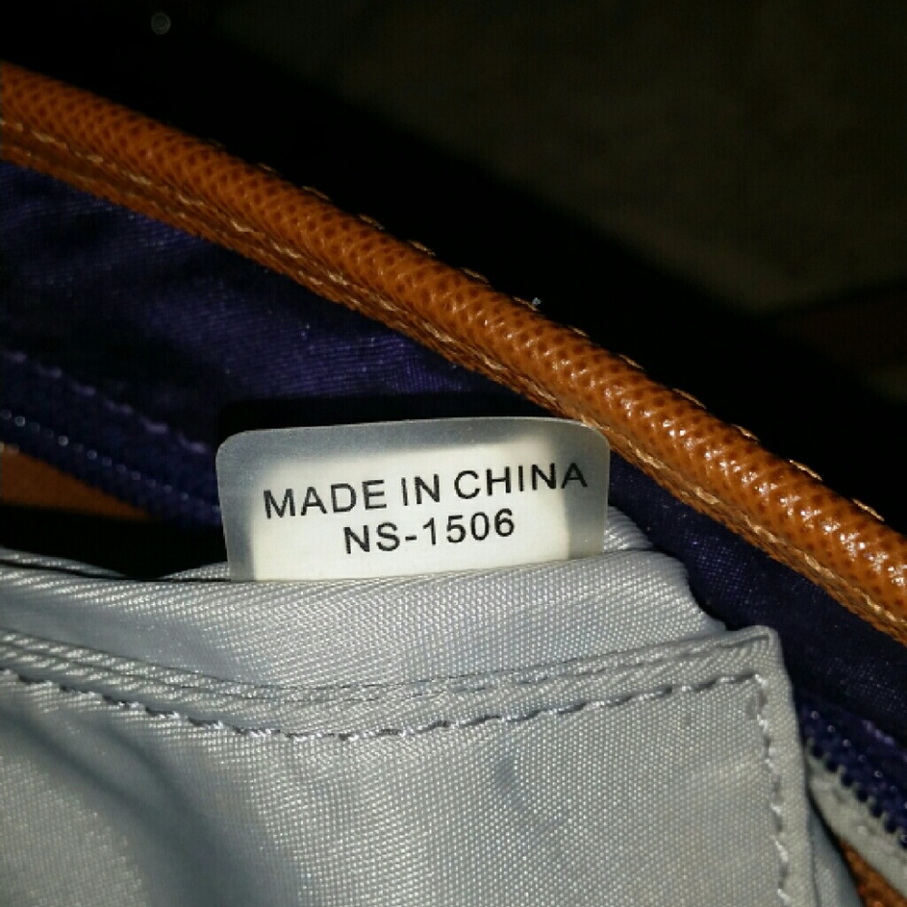 MK original Cross Body eggplant color.
