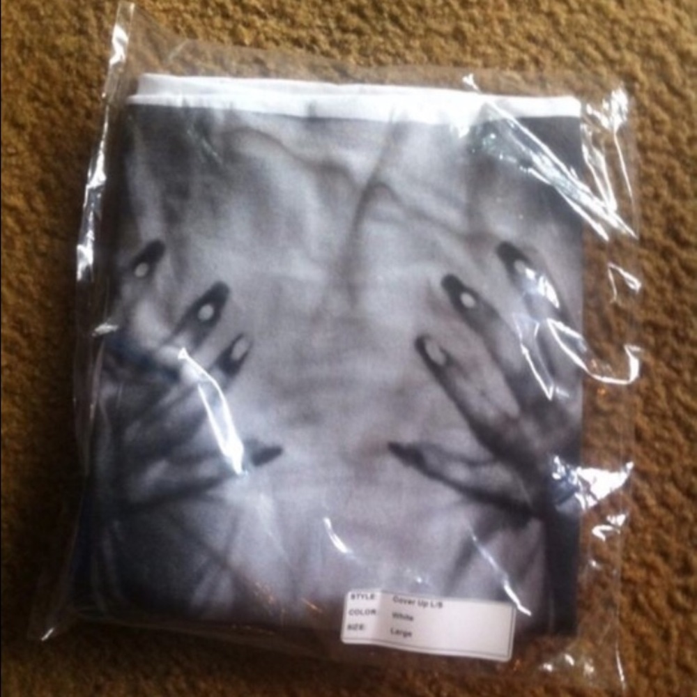 Kylie Jenner "cover up" long sleeved shirt