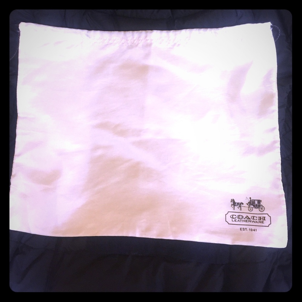 C O A C H- 100% authentic, ivory dust bag.