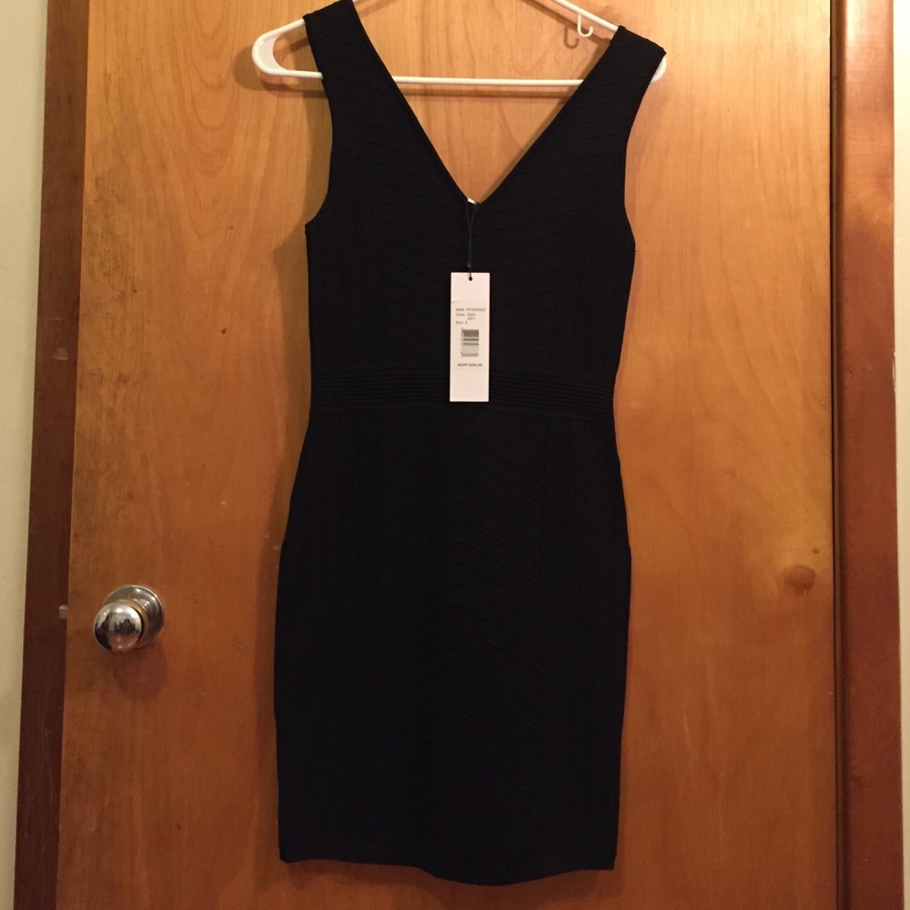 Parker- Black fitted cocktail dress(never worn)