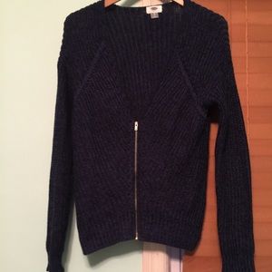 Dark blue zip up sweater with gold zipper