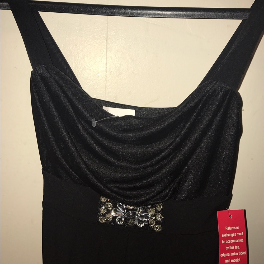 black spaghetti strap dress with accent