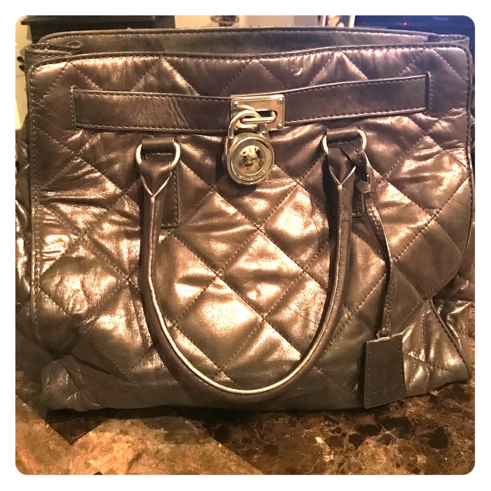 Michael kors lightly used silver quilted Hamilton