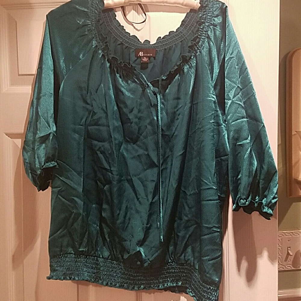 green shiny tunic