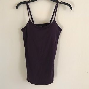 Dark purple/plum colored tank top. NEVER WORN