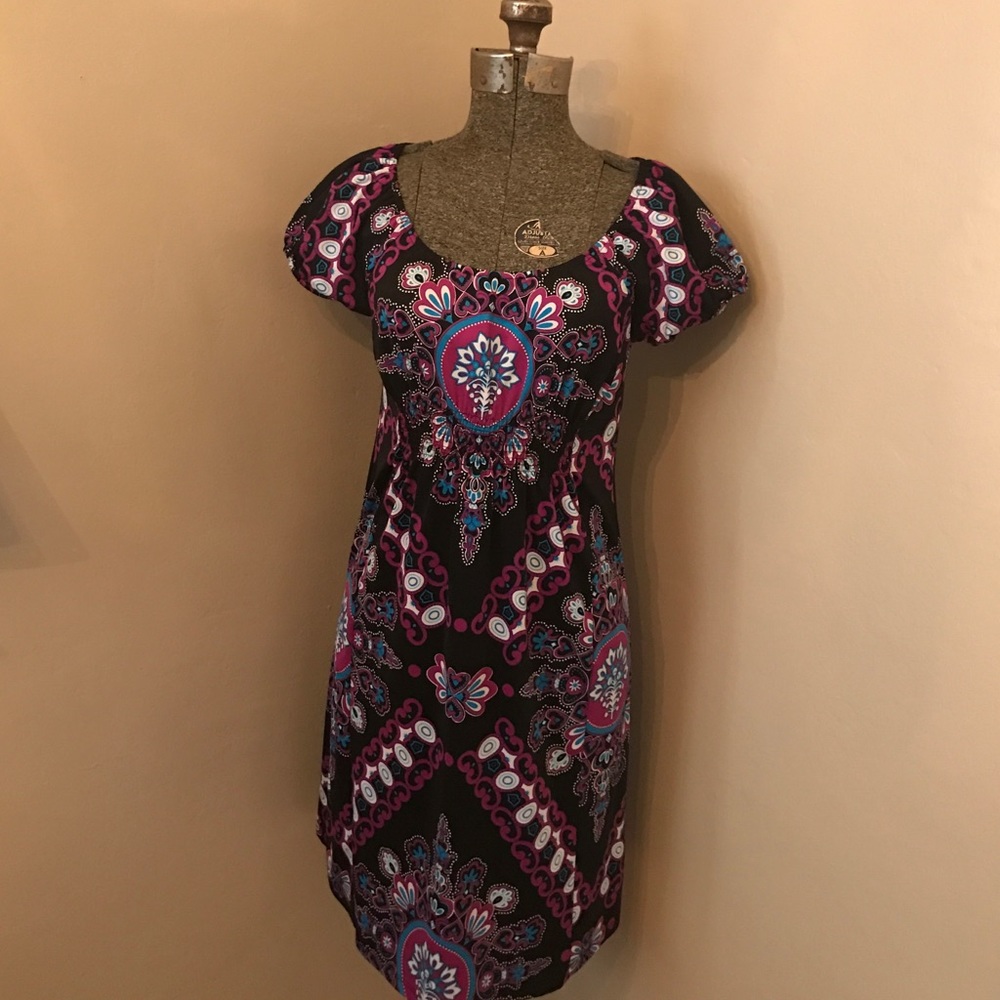 INC dress.No flaws. Black with purple.Cap sleeves