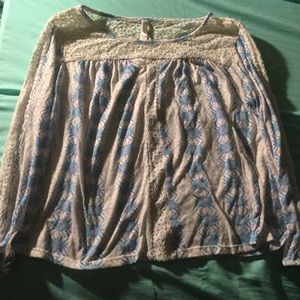 Long sleeve lace shirt.