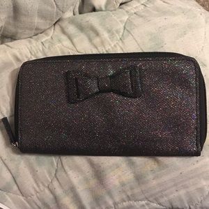 Claire's black sparkly bow wallet