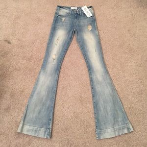 WILDFOX DISTRESSED FLARE JEANS