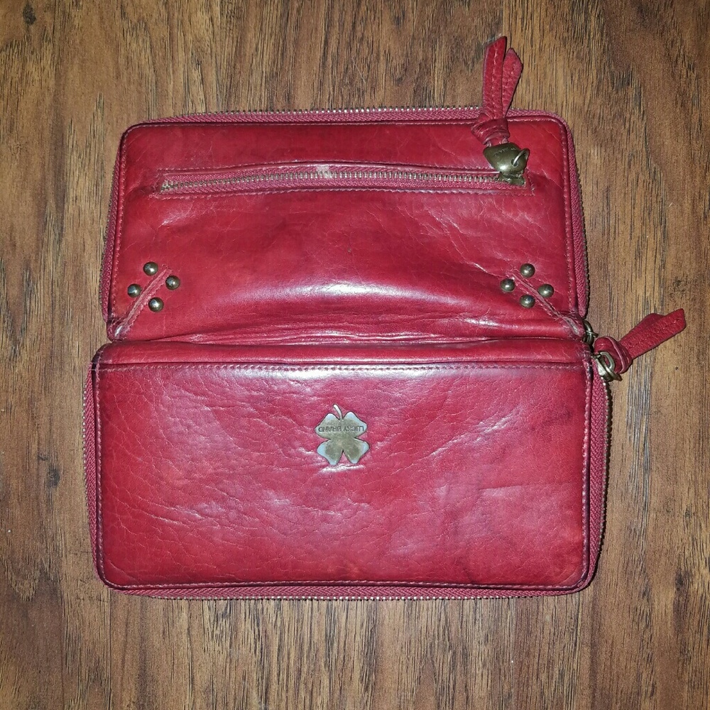 Red leather wallet. Lucky Brand