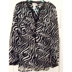 Women's size 2X zebra print blouse.
