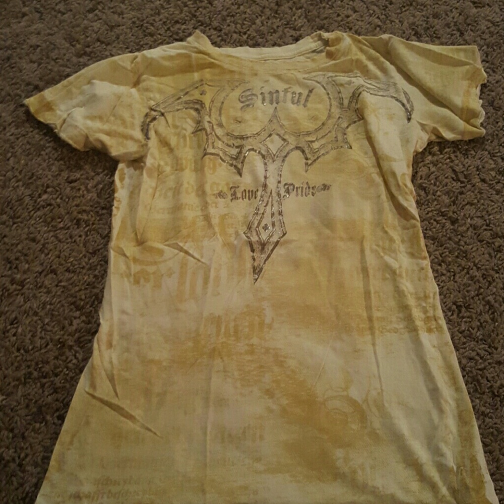 yellow and sliver graphic sinful shirt