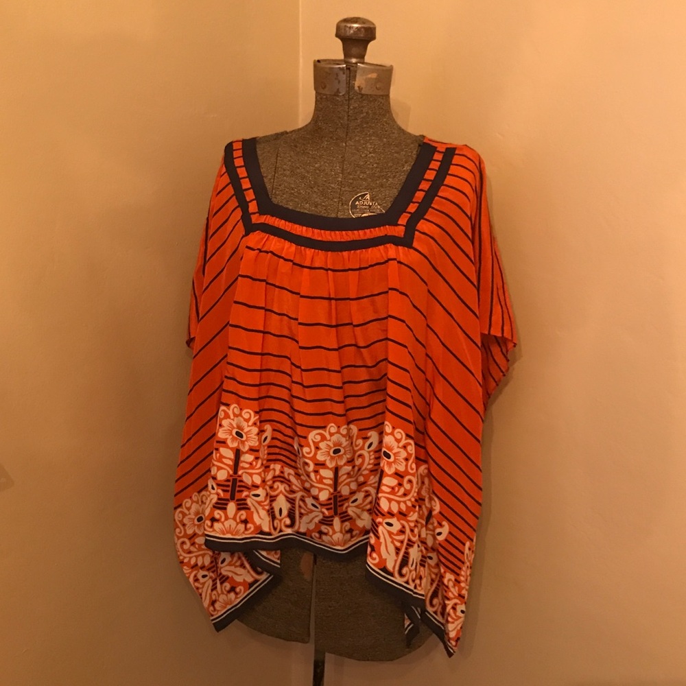 100% silk batwing blouse. No flaws. Ribbon accent