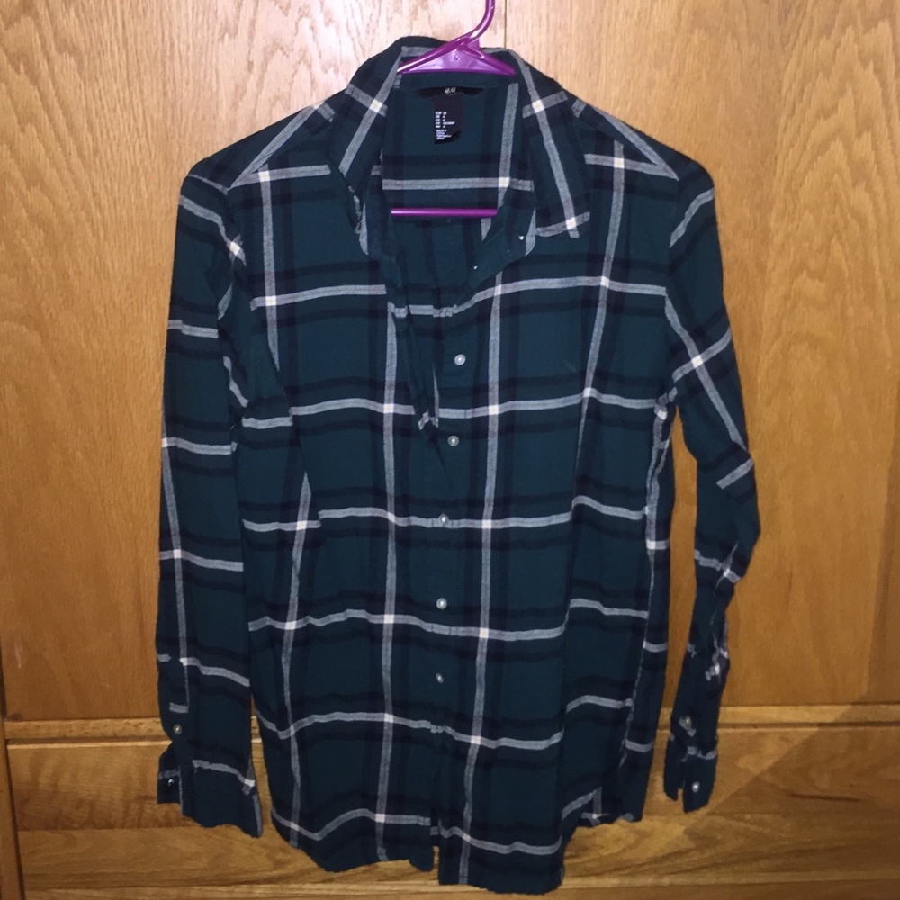 A green H&M flannel shirt
