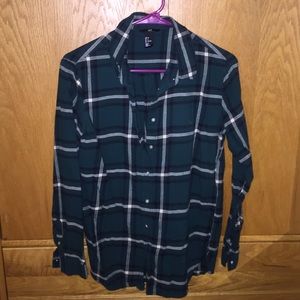 A green H&M flannel shirt