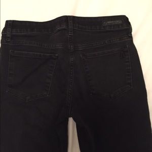 Black articles of society jeans