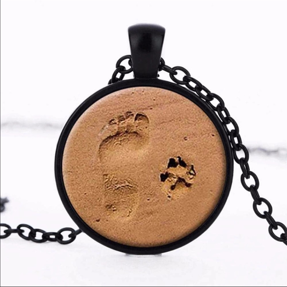 Cute FootPaw prints in the sand black necklace
