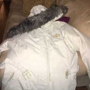 White North Face jacket. Fur hood.