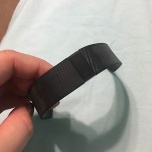 Fitbit Charge. Comes with charging cable