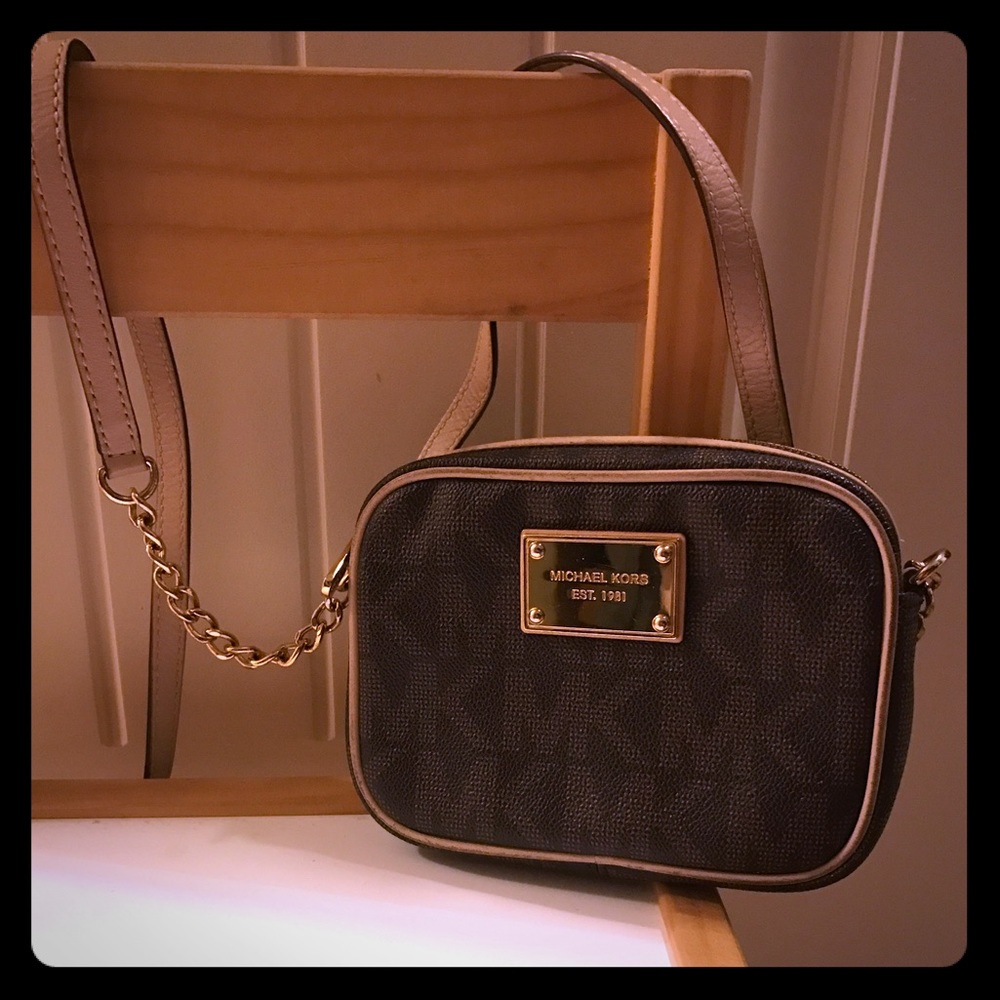 Authentic Michael Kors cross body bag.