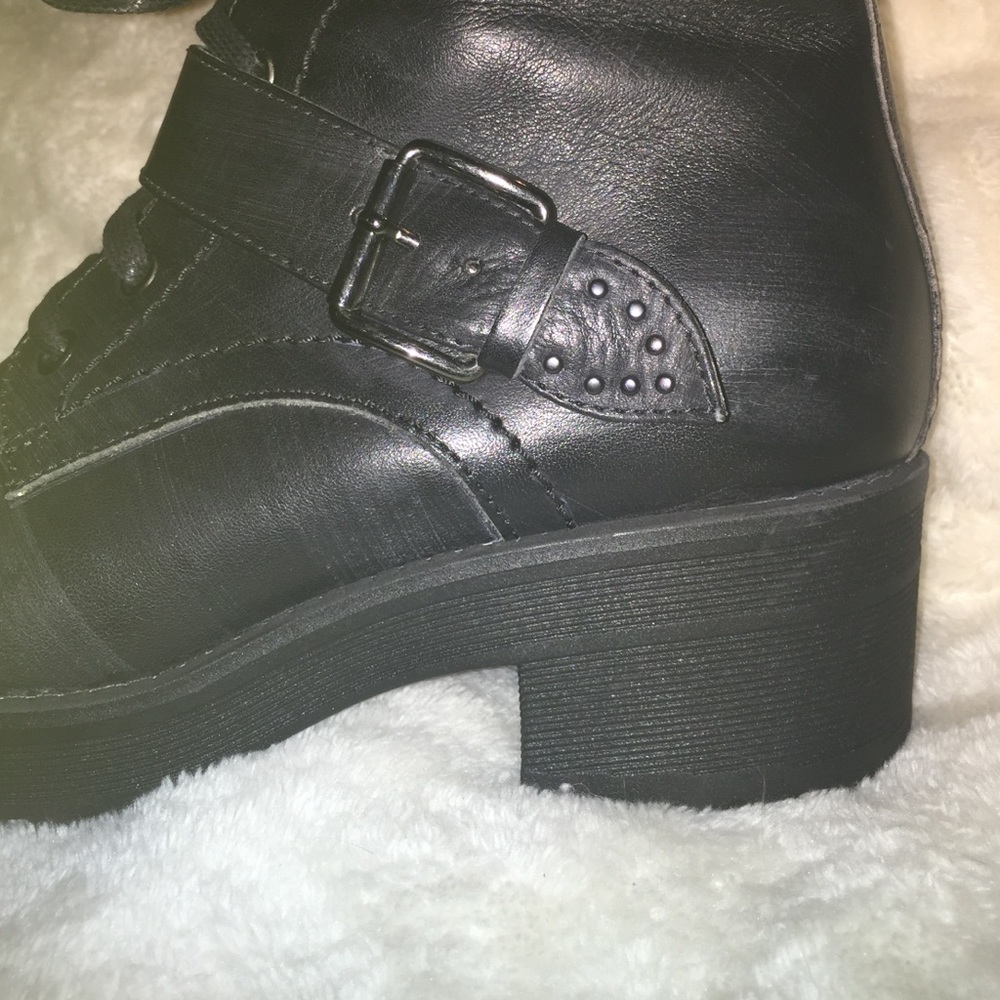 Black leather combat boots