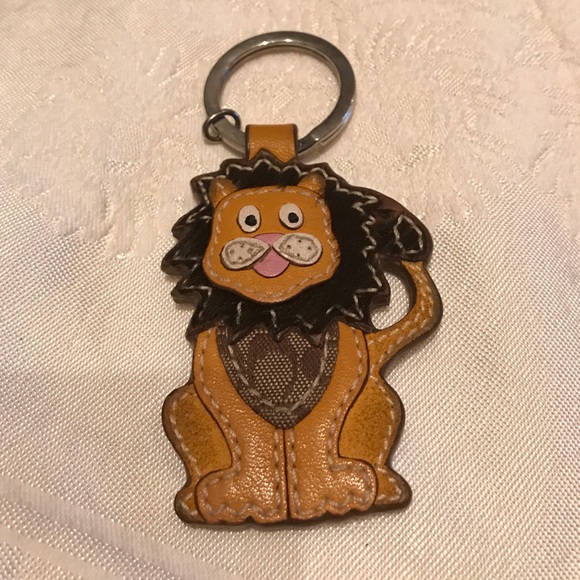 coach lion keychain