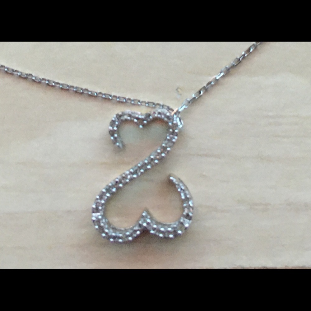 14k white gold open heart with diamonds