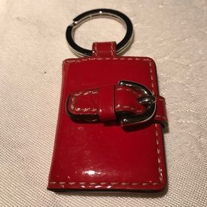 Red patent leather Coach booklet keychain