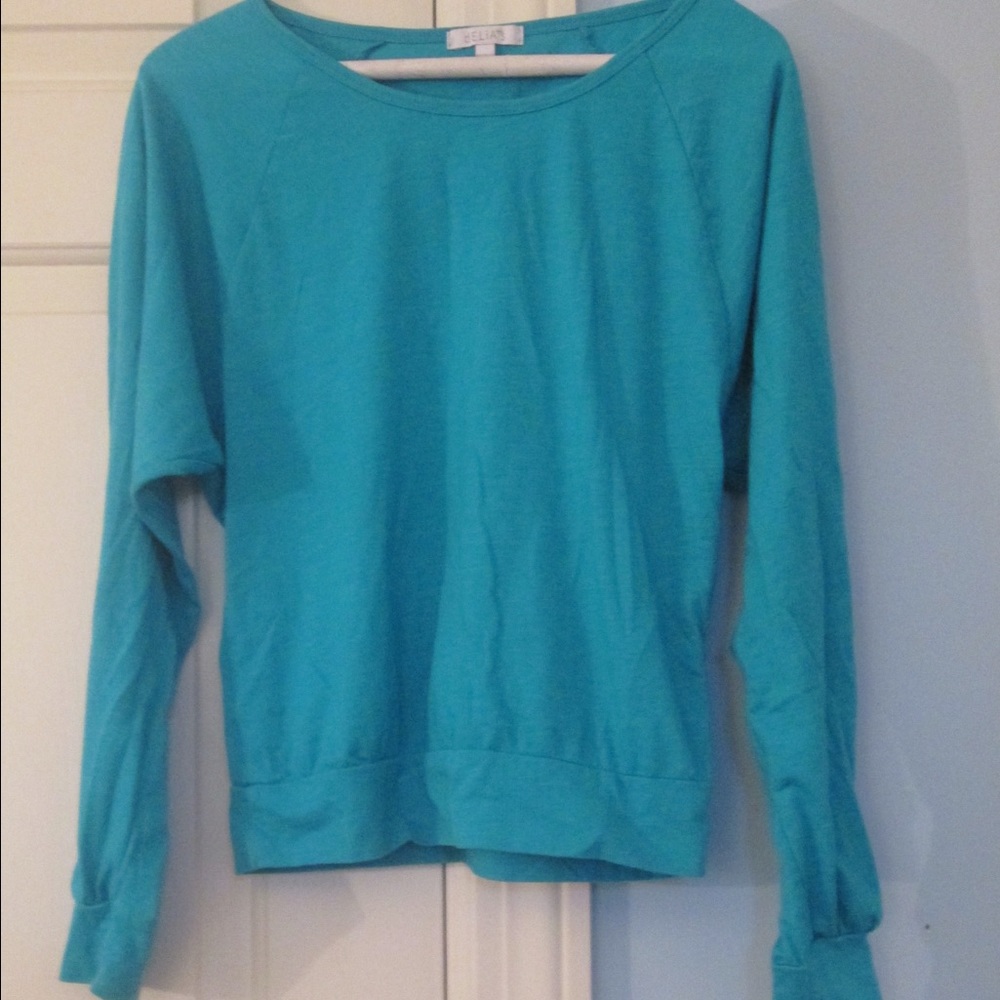 teal coloured banded dolman shirt.
