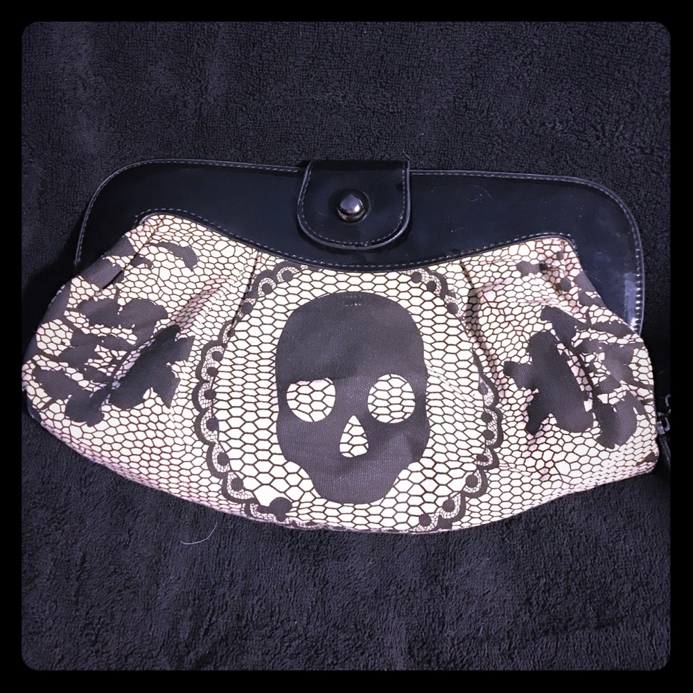 Iron fist printed lace skull clutch purse