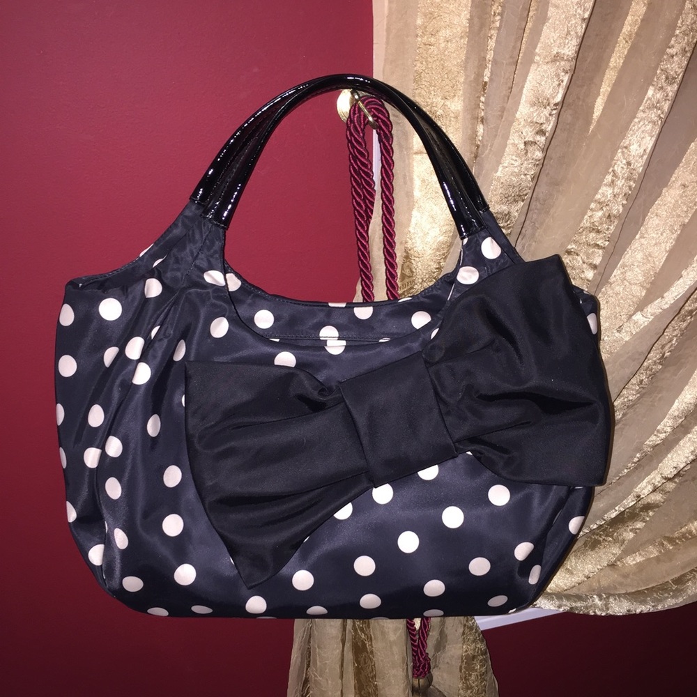 Adorable hand held polka dot Kate Spade bag