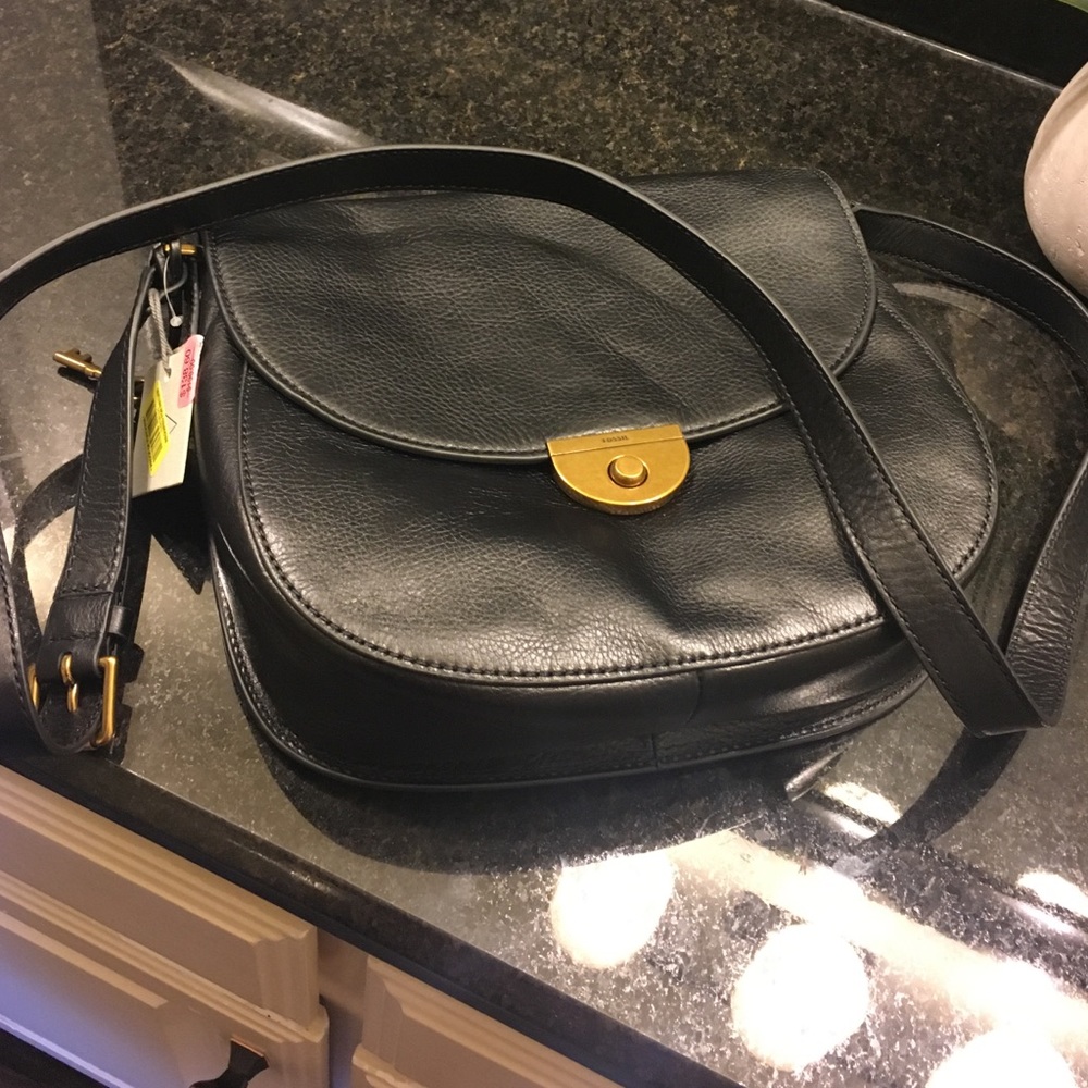 Brand new never been used Fossil purse.