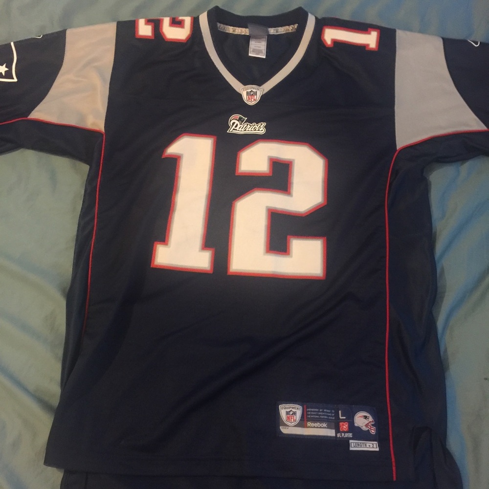 Mint condition Tom Brady jersey. Men's size L